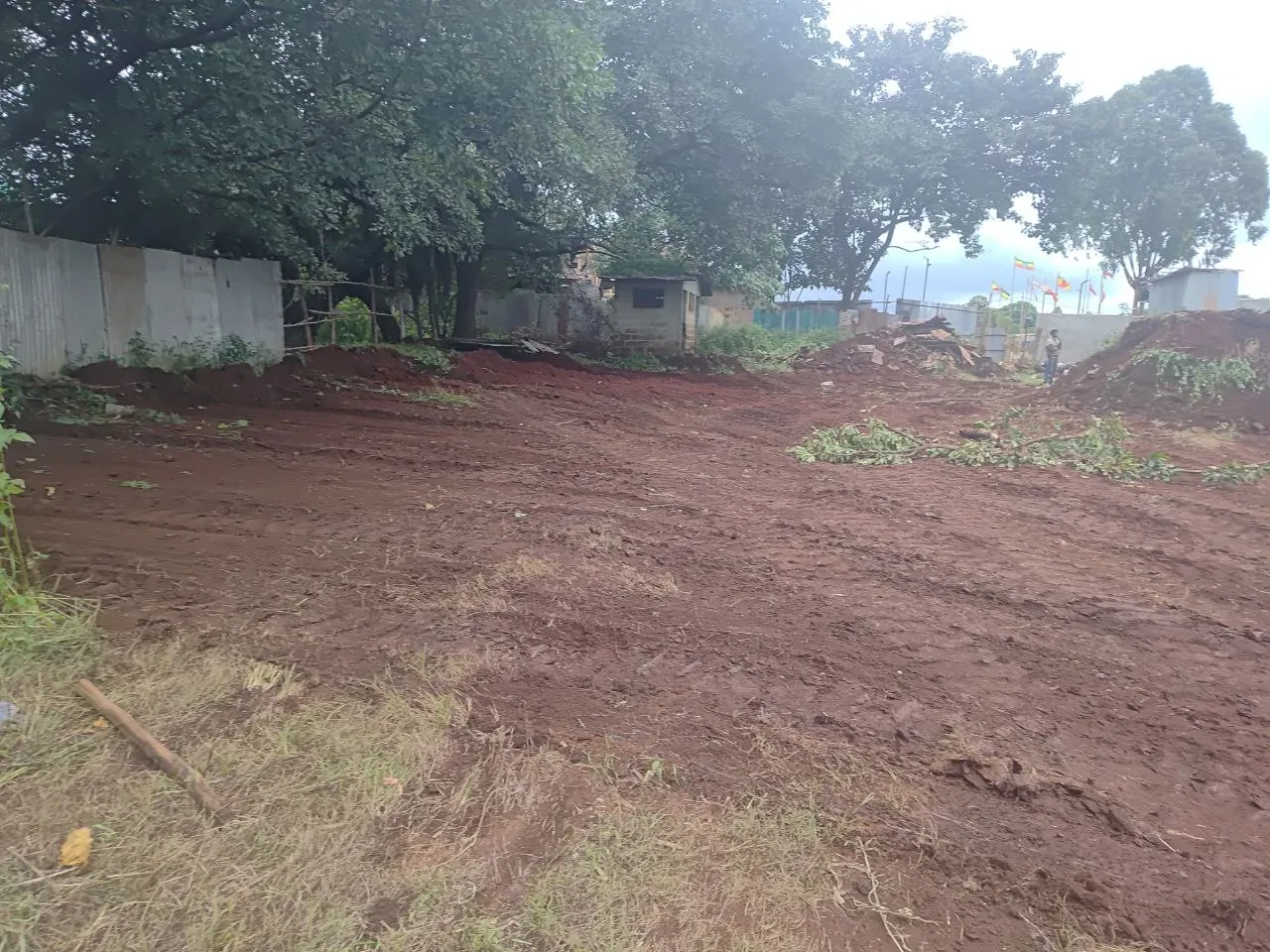 Cleared red-earth site at the start of works for the Assosa City Mini Stadium